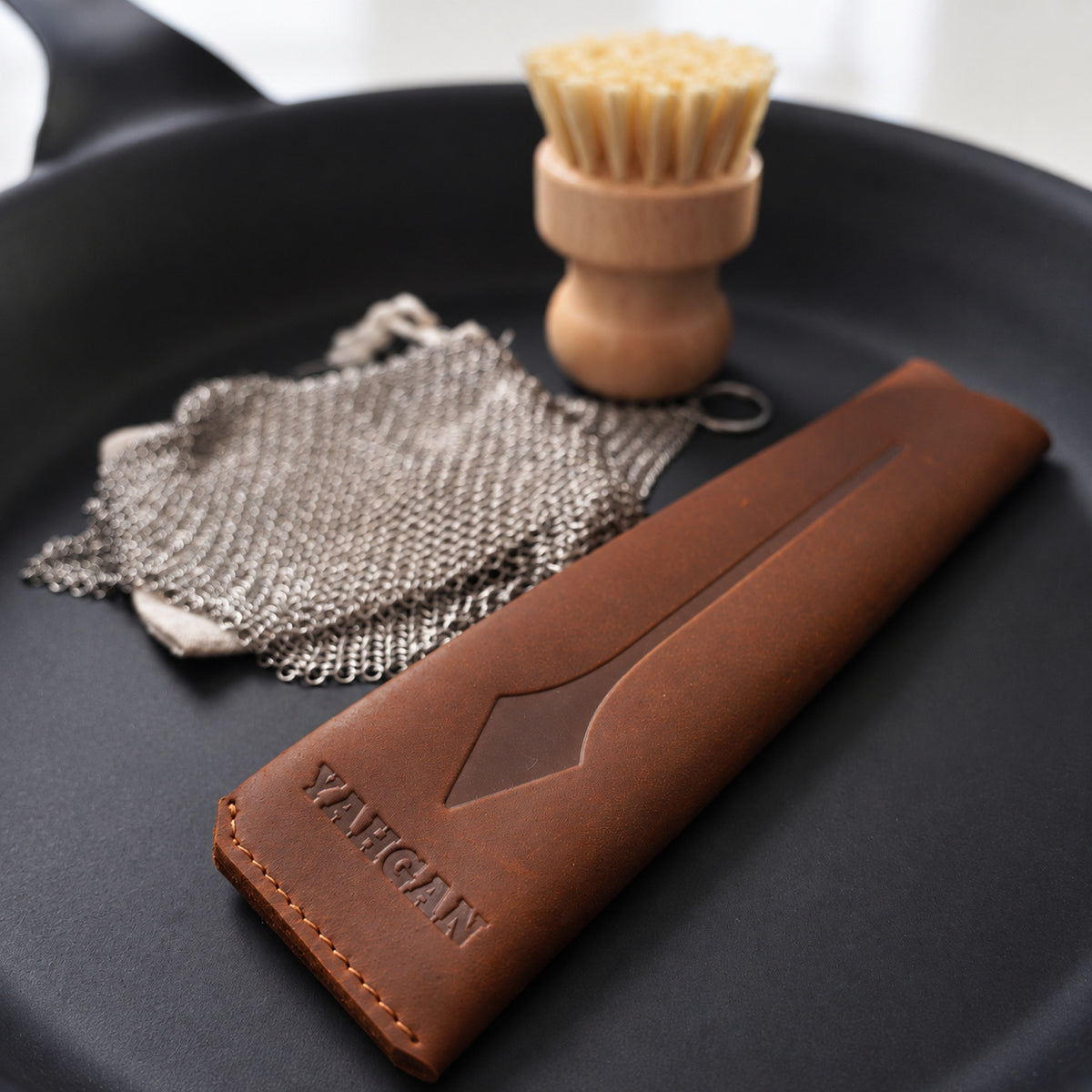 Yahgan Black Series 30cm carbon steel pan with the care kit and leather handle sleeve