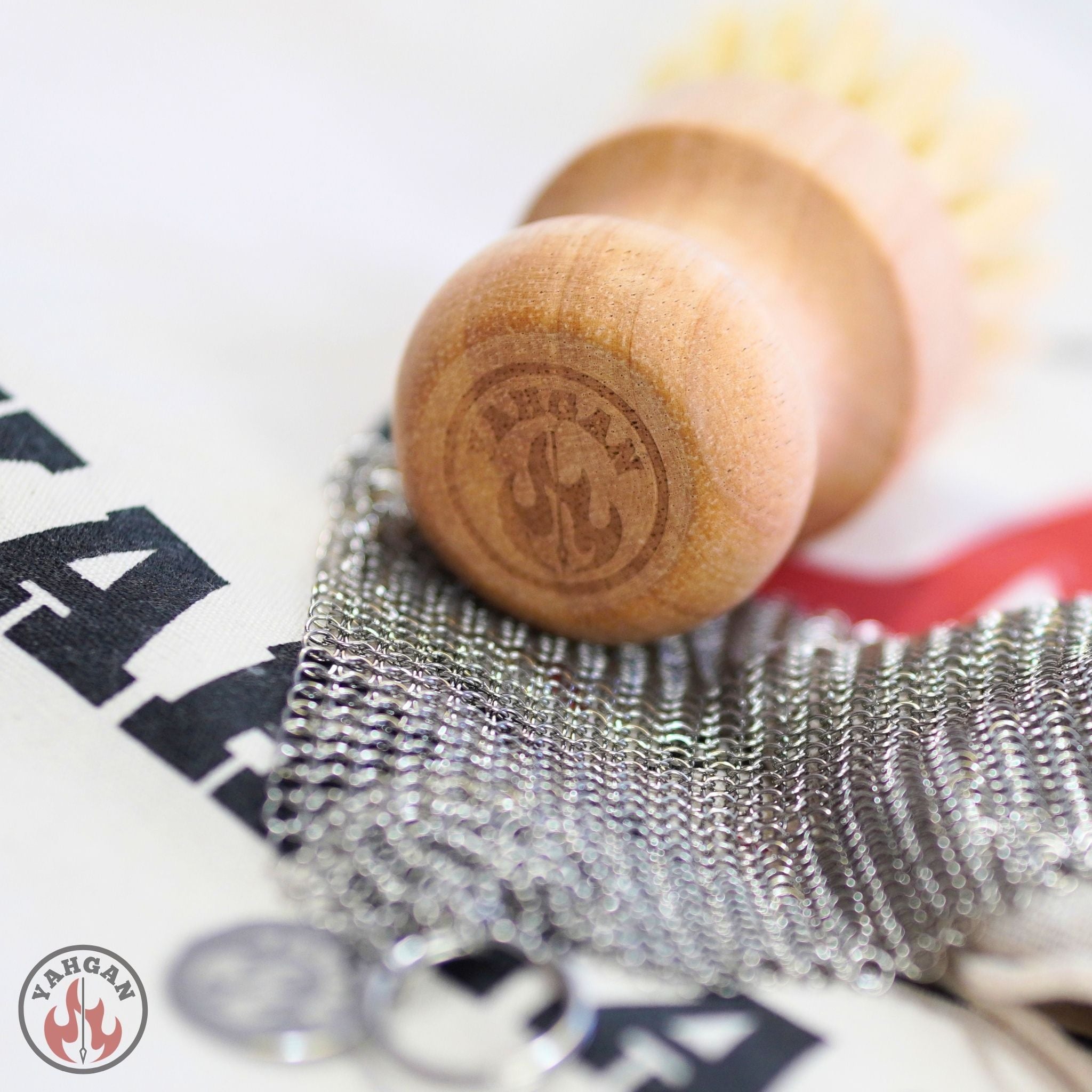 Yahgan beechwood sisal brush and 316L stainless chainmail scrubber — carbon steel pan care kit components