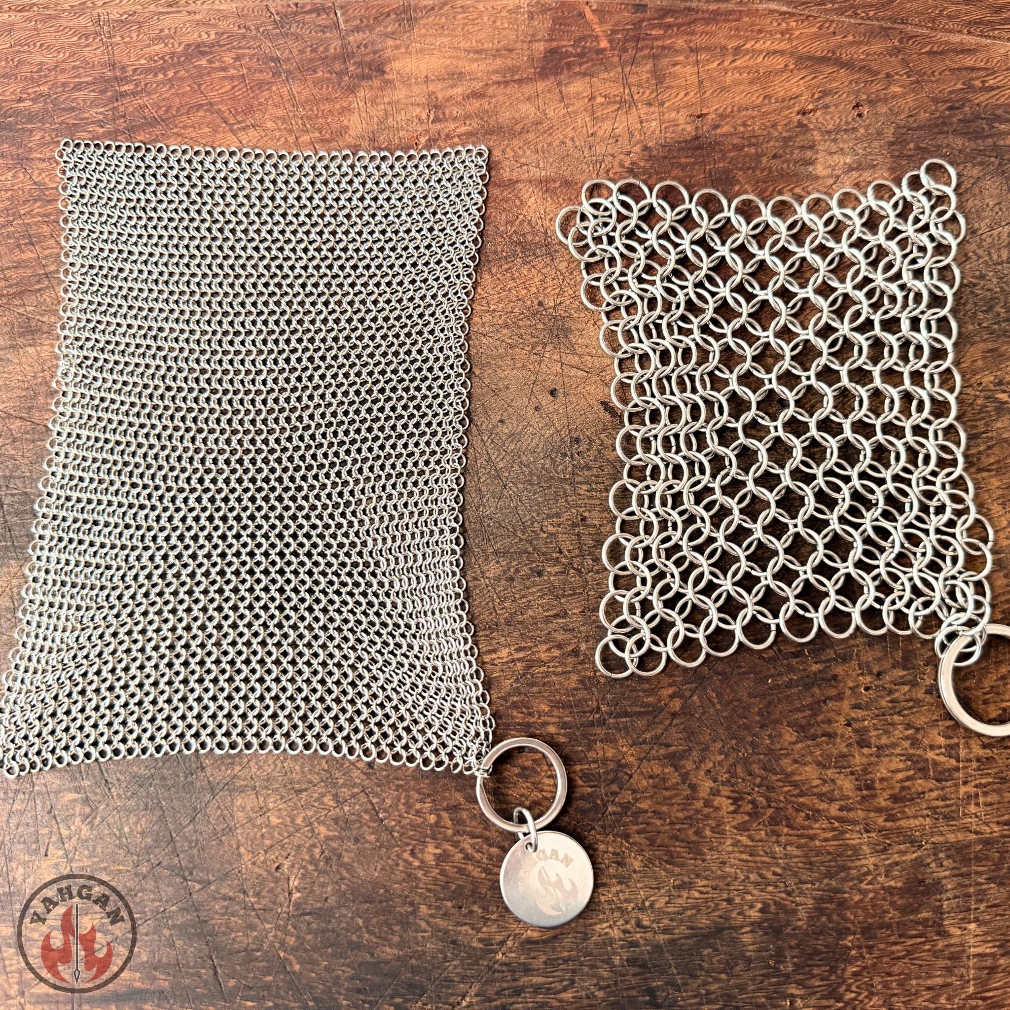 3.8mm Yahgan chainmail scrub compared to standard 8mm chainmail on timber surface — 4x more contact points