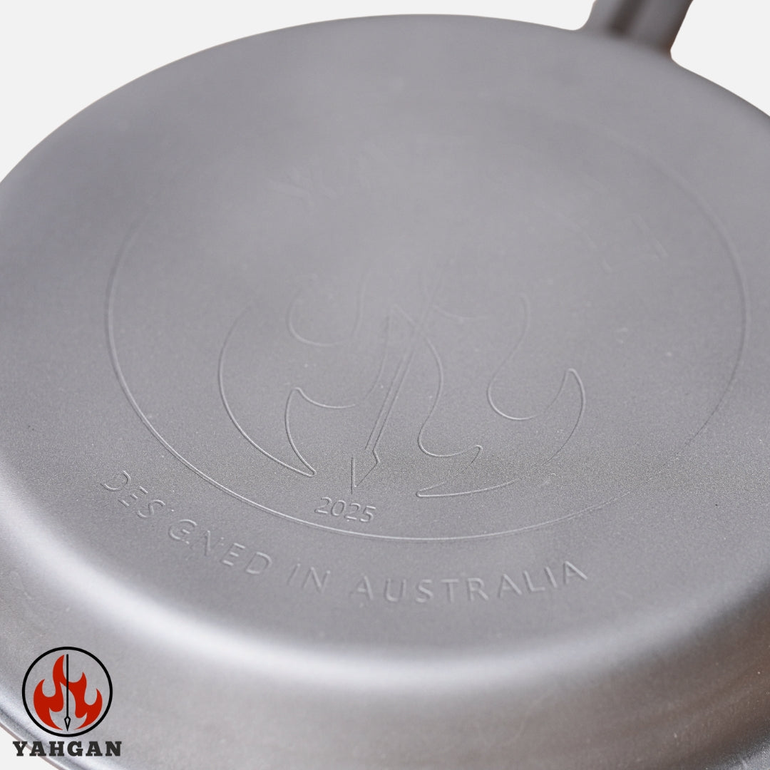 Base of Yahgan Classic Series carbon steel pan — flat forged bottom, compatible with all stovetops including induction