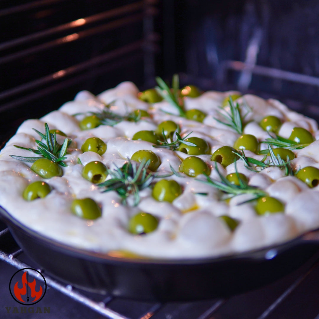 Yahgan Classic Series carbon steel pan in oven with focaccia — oven safe, goes from stovetop to oven with ease